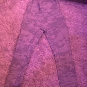 White/camo lulu lemon leggings.  Super cute and trendy.  “Like New”